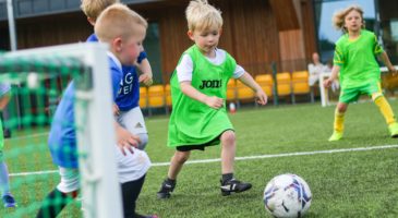 young footballer listening