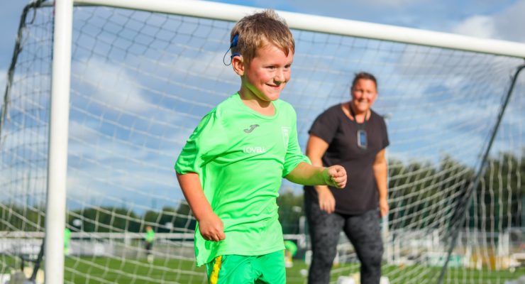 Boy playing football