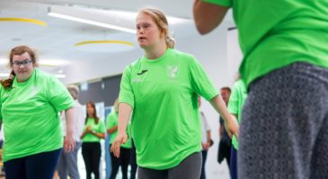 young girl prepares to dance