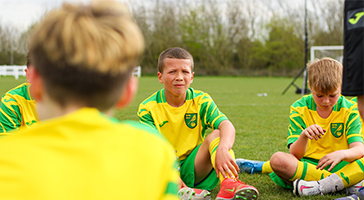 Player listens to a coach