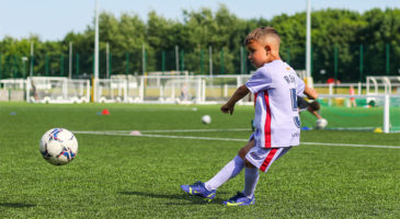 Mini Kicker player kicking the ball