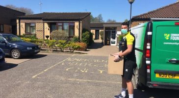 Staff deliver food parcels