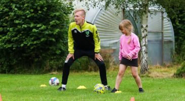 Young participant enjoys PE session at Kenninghall Primary