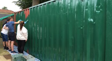 National Citizen Service participants paint at community centre