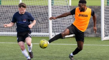 two men playing football