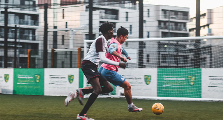 A young person playing football