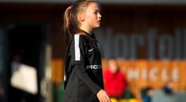 Girl playing football