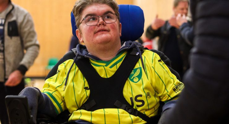 Powerchair player takes part in training