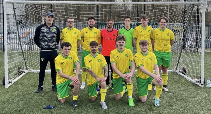 CP Football Team pose for photo in front of goal