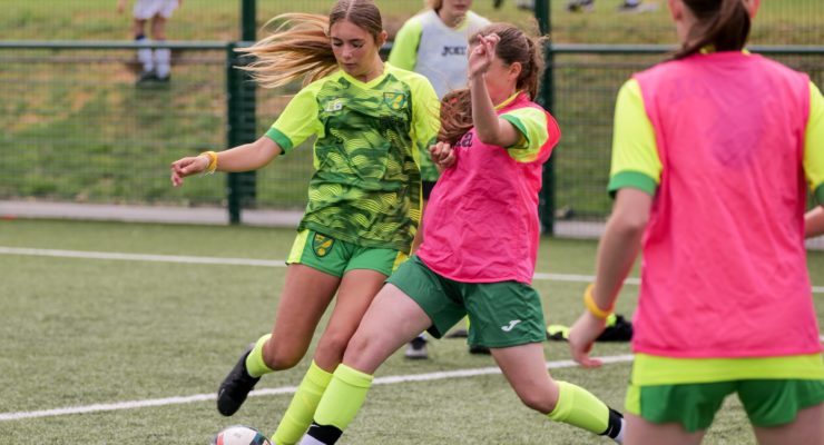 Girls playing football at The Nest, Norwich