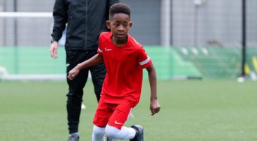 Boy playing football