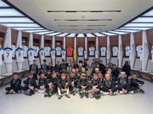 Group of boys in Wembley stadium changing rooms