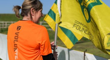 Volunteer  with a flag