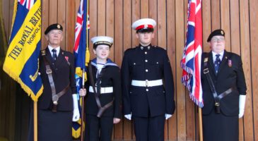 Army cadets with flags