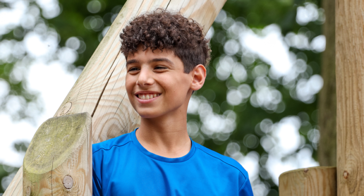 Boy in blue at challenge woods