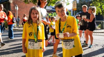 girl and boy with their medals