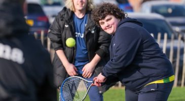 Hope playing tennis