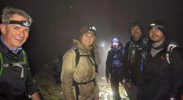 fells walkers in the dark with head torches on