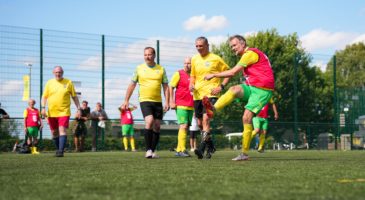 walking football game in action 