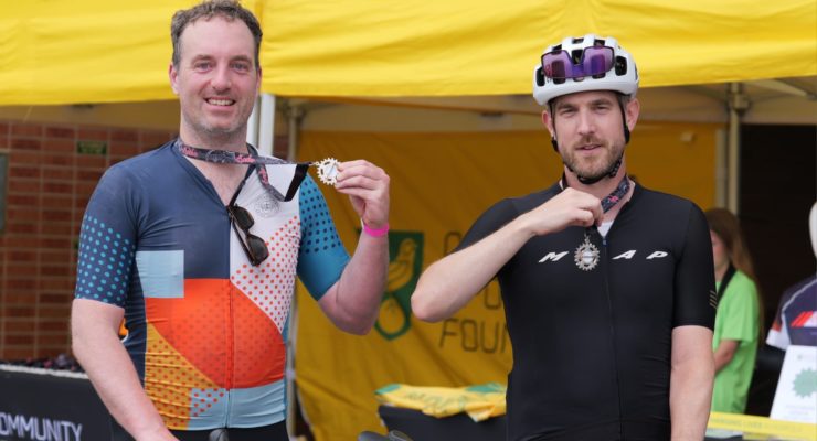 two men with medals round their necks