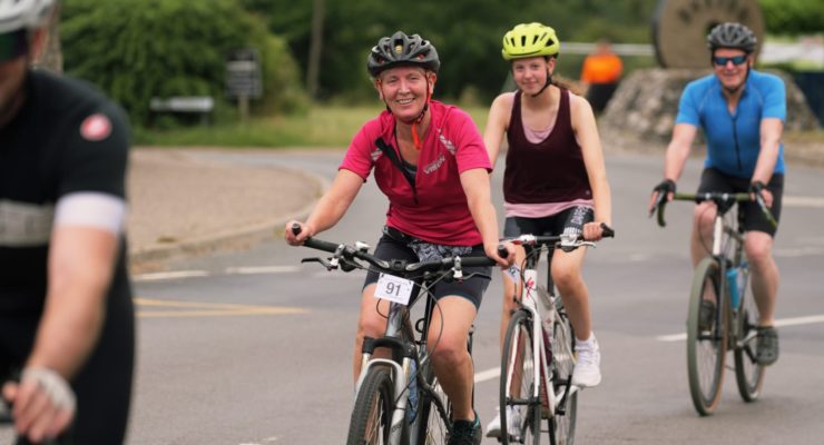 group of people on bicycles on the road