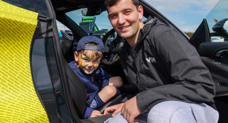Boy sat in car