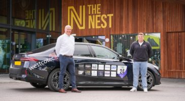 two men with a car