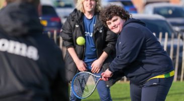 Enjoying tennis at a Realising Potential session