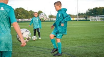 boy playing football