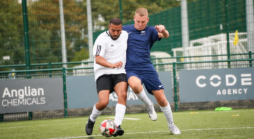 Guys playing football