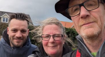 three people taking a selfie