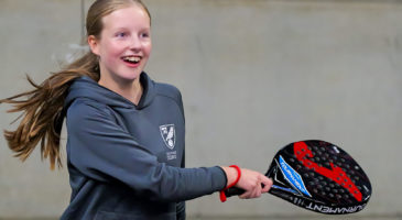 Girl playing padel