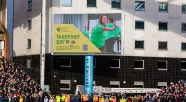 image of a large screen advertising Foundation takeover