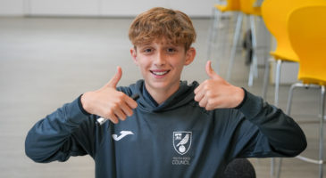 Boy with thumbs up