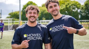 two men with Howes Percival on their tshirts