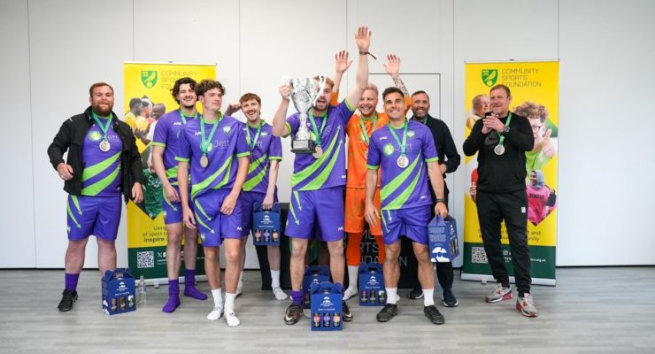 winning team with the trophy