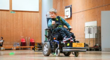 A participant at a PowerChair Football session