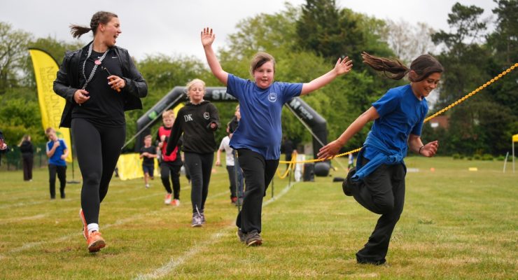 children running and smiling
