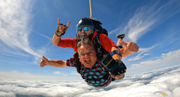 two men free falling in a skydive