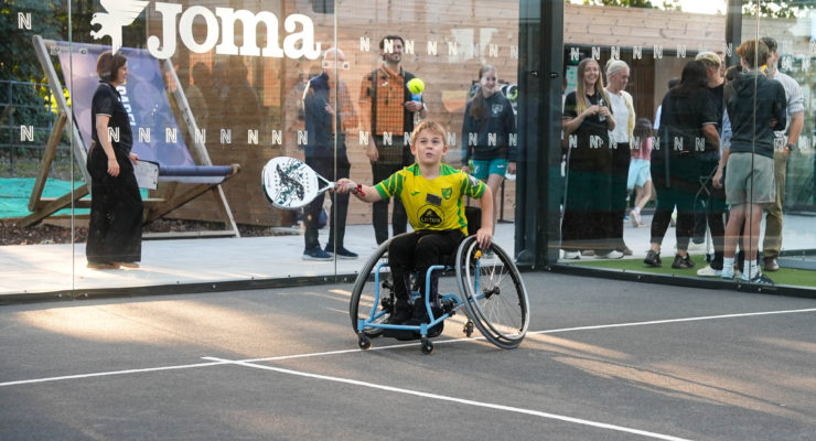 A wheelchair padel participant testing out the new facilities